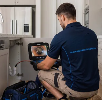 Clearing a blocked sink at a Dover Heights property